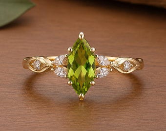 Anillo de hoja de peridoto / Anillo de compromiso inspirado en la naturaleza / Anillo de gema marquesa verde / Anillo botánico de oro / Regalo de joyería inspirada en el bosque