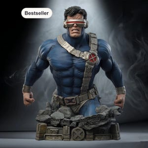 Puede incluir: Busto azul de Cíclope con visera roja y detalles plateados. La estatua está sobre una base rocosa con el logo de X-Men. La palabra "Bestseller" está en un óvalo blanco en la esquina superior izquierda.
