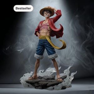 May include: A figurine of a male anime character wearing a red jacket, blue shorts, and a straw hat. The figure is standing on a rocky base with a smoky background. The character is smiling and has a yellow sash around the waist.