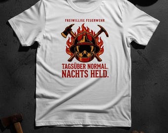 May include: White t-shirt with a firefighter graphic. The design features a firefighter helmet, crossed axes, and flames, with the text "FREIWILLIGE FEUERWEHR" and "TAGSÜBER NORMAL. NACHTS HELD."