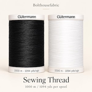 May include: Two spools of Gütermann sewing thread, one black and one white, each labelled 1000 m - 1094 yds/vgs. The text Bolthousefabric appears at the top, and Sewing Thread 1000 m / 1094 yds per spool is printed at the bottom.