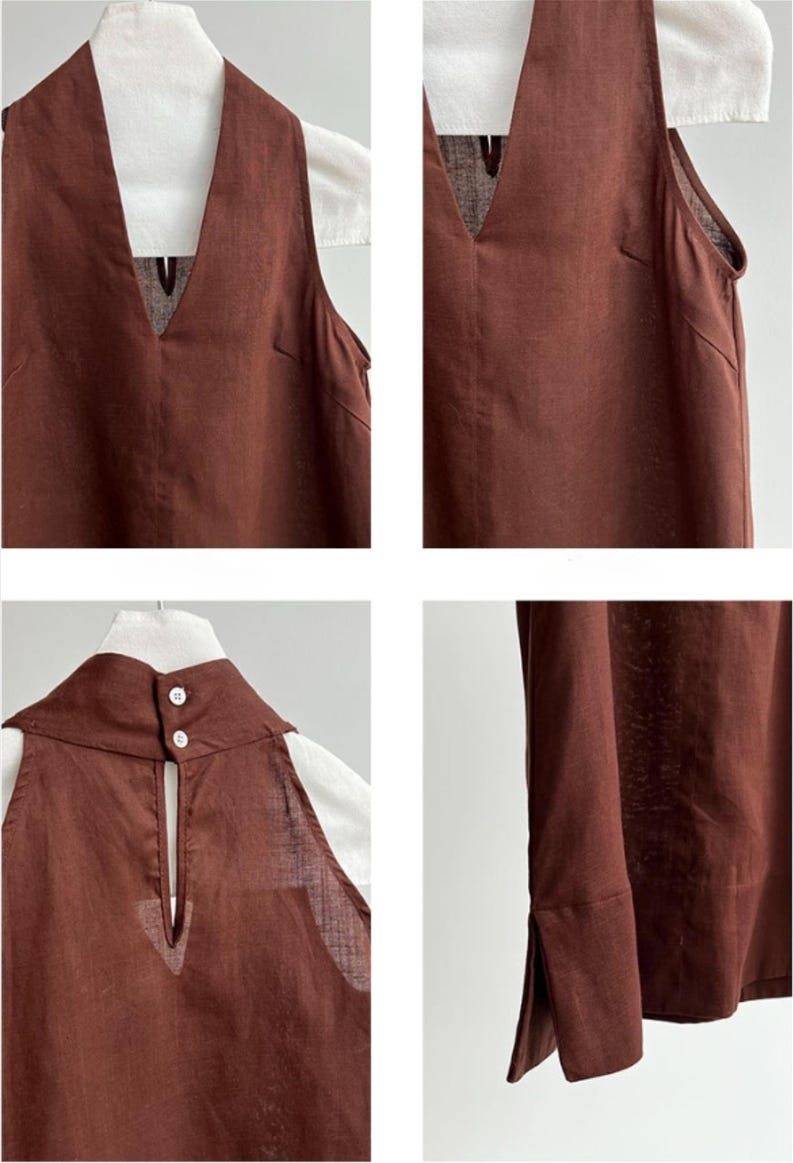 May include: A sleeveless brown top featuring a deep V-neckline, a high collar with two white buttons at the back, a keyhole opening, and side slits at the hem. The garment is constructed with visible seams and a textured fabric finish.