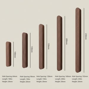 May include: Five rectangular dark brown wooden cabinet pulls of varying lengths. The lengths are labelled as 100mm, 130mm, 150mm, 200mm, and 230mm. Each pull has a consistent height of 20mm and specific hole spacing measurements of 64mm, 96mm, 128mm, 160mm, and 192mm.
