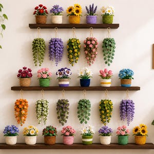May include: A collection of crocheted potted plants and hanging baskets arranged on three dark wooden shelves. The display features various colorful flowers and trailing greenery, including sunflowers, daisies, roses, and lavender, all crafted with yarn.