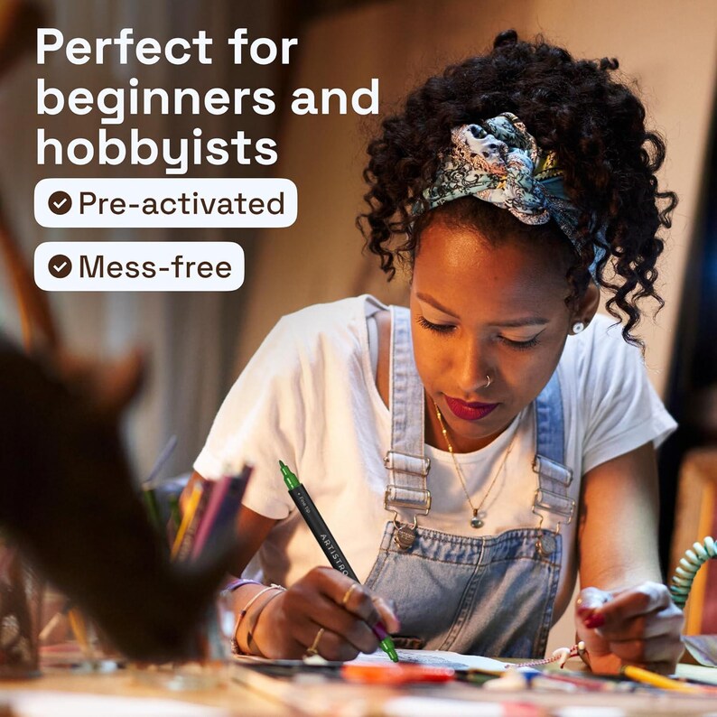 May include: A person is using a green marker to draw on paper. The marker is black with green ink. The image includes the text: "Perfect for beginners and hobbyists", "Pre-activated", and "Mess-free".