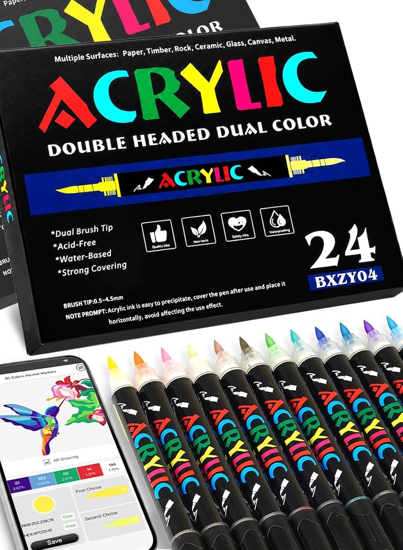 K&ouml;nnte beinhalten: Ein Set aus 24 doppelseitigen Acrylmarkern in einer schwarzen Schachtel mit der Aufschrift ACRYLIC DOUBLE HEADED DUAL COLOR. Die Box listet Merkmale wie Dual-Pinselspitzen, s&auml;urefrei, wasserbasiert und stark deckende Tinte auf.