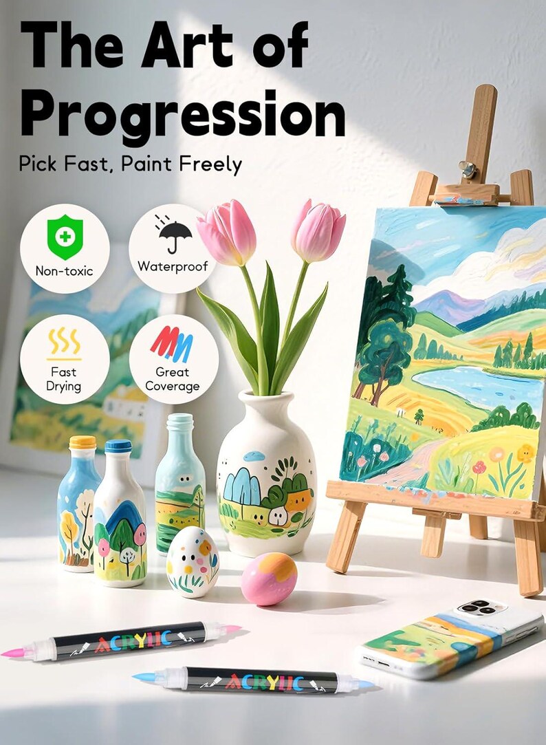 K&ouml;nnte beinhalten: Acryl-Farbstifte mit schwarzem Geh&auml;use und zwei Spitzen, pr&auml;sentiert mit bemalten Flaschen, einem Ei, einer Handyh&uuml;lle und einer Leinwand auf einer Holzstaffelei. Text: The Art of Progression, Pick Fast, Paint Freely, Non-toxic, Waterproof, Fast Drying, Great Coverage.