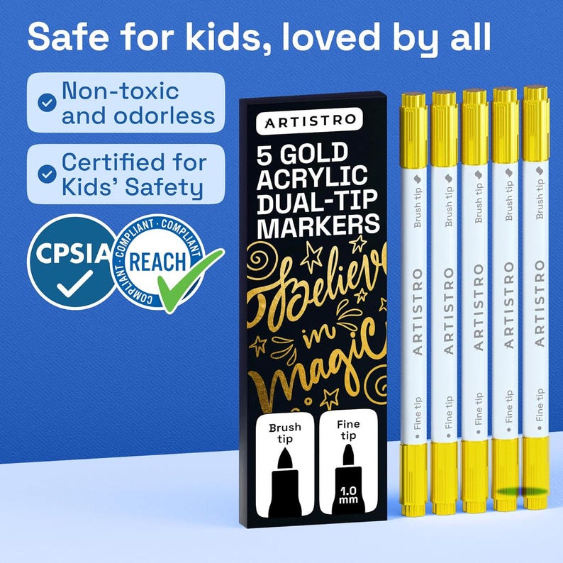 May include: Five gold acrylic dual-tip markers with white barrels and gold caps. The packaging is black with gold text reading 5 GOLD ACRYLIC DUAL-TIP MARKERS and Believe in magic. Features include non-toxic, odorless, and CPSIA and REACH compliance.