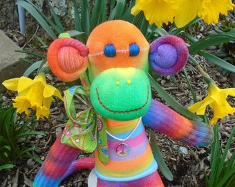 Colorful Tie Dye Sock Monkey Doll With Bright Sweater And Peace Sign Earring