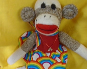 Rainbow Girl Brown Sock Monkey Doll Dressed In Rainbow Skirt And Rainbow Necklace