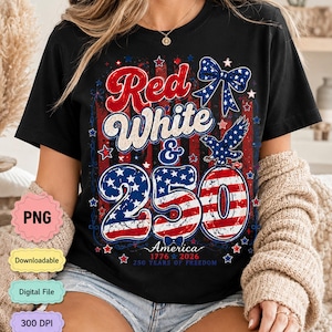 May include: A black t-shirt featuring a patriotic graphic with the text Red White & 250 America 1776 2026 250 Years of Freedom. The design includes a distressed American flag pattern, a blue bow, a bald eagle, and stars in red, white, and blue.
