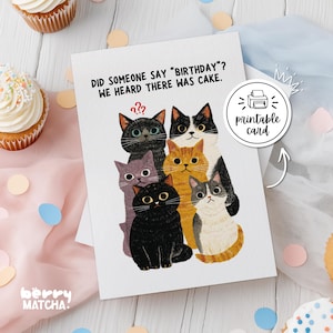 Puede incluir: Una tarjeta de felicitación blanca con una ilustración de seis gatos de varios colores y patrones. El texto dice: DID SOMEONE SAY "BIRTHDAY"? WE HEARD THERE WAS CAKE. Una insignia circular en la tarjeta muestra un icono de impresora y el texto printable card.
