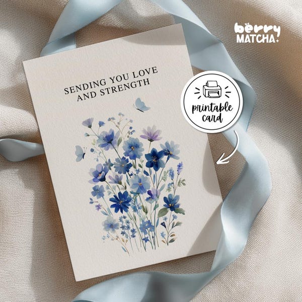 May include: A cream-colored greeting card featuring a watercolor illustration of blue wildflowers and two small butterflies. The text reads, "SENDING YOU LOVE AND STRENGTH." A circular sticker on the card displays a printer icon and the text "printable card."