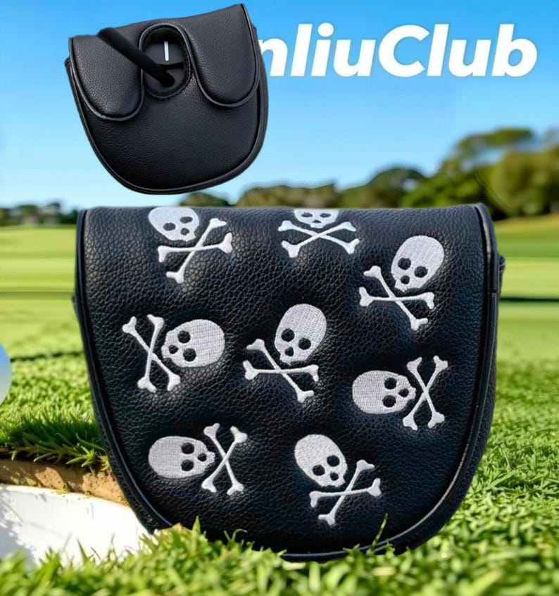 May include: A black mallet putter headcover featuring a white embroidered skull and crossbones pattern. The cover has a textured faux leather finish and a magnetic closure. A smaller view of the top of the headcover is included, with the text "nliuClub" visible in the upper right corner.