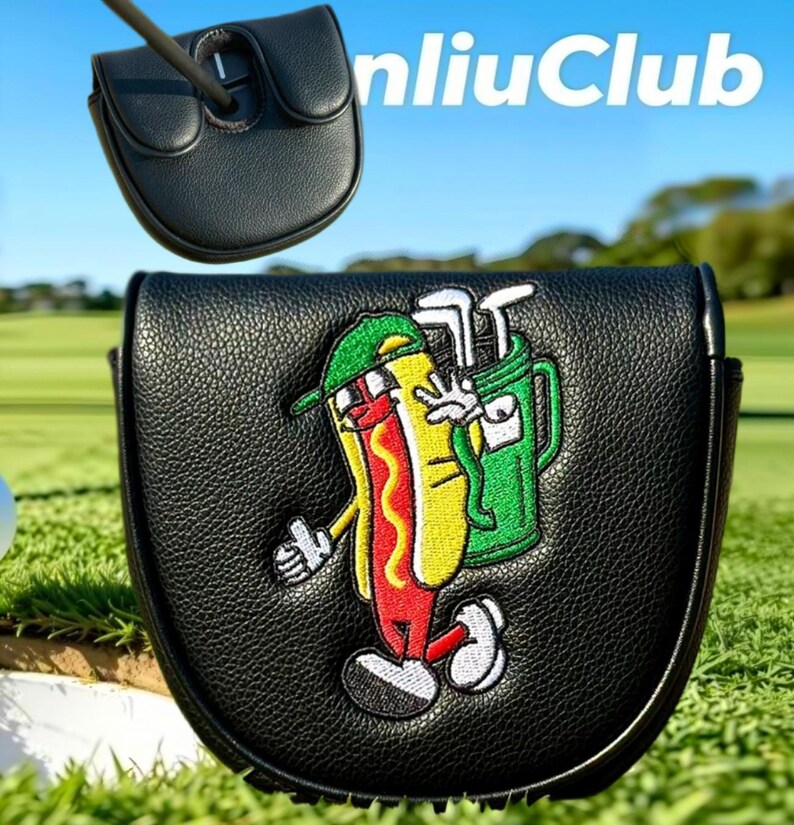 May include: A black leather mallet putter headcover featuring an embroidered cartoon hot dog wearing a green cap and carrying a green golf bag. The design includes white gloves and shoes. The text "nliuClub" appears in white in the upper right corner.