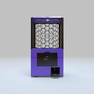 May include: A purple and black vending machine with a geometric honeycomb pattern on the front. The machine has a black door and a small opening at the bottom. The top of the machine is also black.