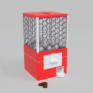 May include: A red gumball machine with a white dispensing mechanism and a honeycomb-patterned cage. The machine contains gray gumballs and sits on a gray surface. A few brown coins are at the base.