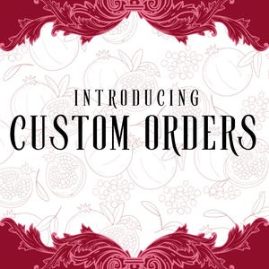 May include: A graphic announcement featuring the text INTRODUCING CUSTOM ORDERS in black lettering. The background is white with faint line drawings of pomegranates, framed by dark red ornate scrollwork at the top and bottom edges.