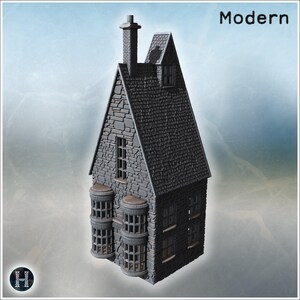May include: A gray miniature stone building model with the word Modern printed in the top right corner. The structure features a tall chimney, a steep shingled roof, multiple rectangular windows, and two prominent rounded bay windows on the front.