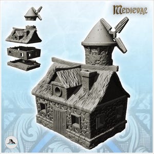 May include: A gray 3D printed miniature building model labeled Medieval, featuring a stone-textured cottage with a thatched roof, a chimney, and a tall windmill tower with four blades. The model is modular, showing four separate stacked components.
