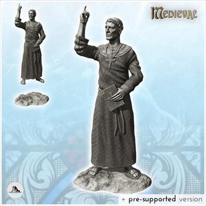 May include: A gray miniature figurine of a monk wearing a hooded robe, a cross necklace, and sandals. The figure holds a book in one hand and raises the other index finger. The text MEDIEVAL is visible in the top right corner of the image.