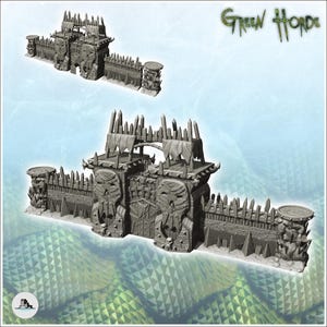 May include: A gray miniature fortress wall section featuring a central gate with two large skull motifs, pointed wooden palisades, and circular end towers. The text Green Horde is visible in the upper right corner of the image.