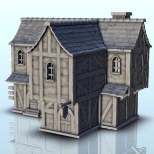 Puede incluir: Un edificio en miniatura de dos plantas con fachada de entramado de madera, que presenta un tejado de tejas gris oscuro, ventanas arqueadas y un pequeño letrero colgante. La estructura muestra una textura de piedra gris claro con vigas.