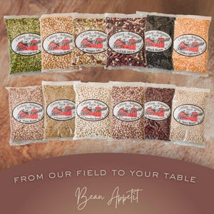 May include: A collection of clear plastic bags filled with various dried beans, including green split peas, pinto beans, and black beans. Each bag features a label with the text "Carlson-Arbogast Farm Bean Appetit". The image also includes the text "From our field to your table".