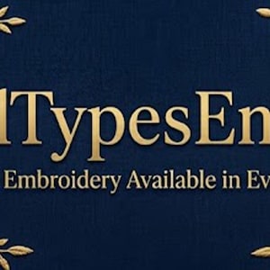 May include: A dark blue banner featuring intricate gold floral embroidery patterns on both sides. The text "AllTypesEmb" is centered in large gold letters, with the smaller text "Custom Embroidery Available in Every Type" positioned directly below it.