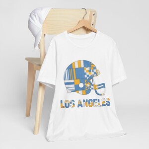 Camiseta de fútbol americano Los Angeles Powder Blue & Gold Patchwork Helmet, camiseta retro para el día del partido, ropa unisex para aficionados, regalo deportivo imagen 4