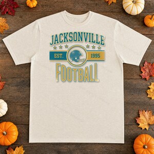 Escudo de fútbol americano vintage de Jacksonville en formato PNG, diseño retro universitario para sublimación, descarga digital. imagen 2