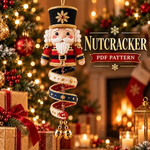 May include: A crocheted nutcracker ornament with a black hat, red jacket, and white beard, featuring a spiral tail in cream, blue, and gold. The text NUTCRACKER PDF PATTERN is displayed in gold lettering against a festive holiday background.