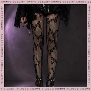 May include: Black fishnet tights featuring a repeating butterfly pattern throughout the legs. The text FANTASTIC COLASTIC is printed repeatedly along the border of the image frame. The hosiery is worn with black lace trim and dark footwear.