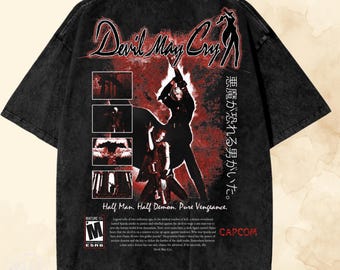 ヴィンテージ デビルメイクライ グラフィック T シャツ - アシッドウォッシュ加工のオーバーサイズ ゲーマー T シャツ。