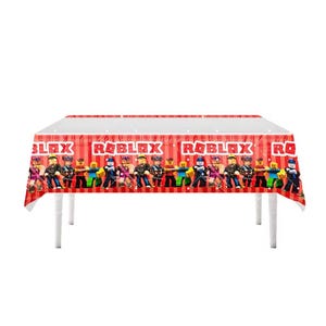 May include: A rectangular plastic tablecloth featuring a red and white striped background with the Roblox logo printed in white text. The design includes a repeating pattern of various blocky character figures across the side panels.
