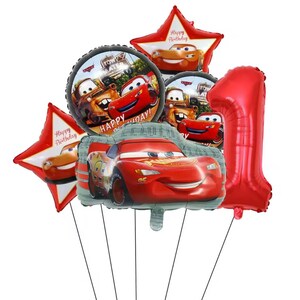 May include: A collection of red and themed balloons, including a number one, star-shaped balloons with the text "Happy Birthday", and round balloons featuring Lightning McQueen and Mater from the movie Cars. The balloons are designed for a birthday celebration.