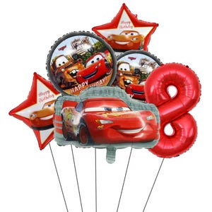 May include: A collection of colorful foil balloons featuring characters from the movie Cars. Includes a red number 8 balloon, star-shaped balloons with Lightning McQueen, and round balloons with Mater and Lightning McQueen. The balloons are for a birthday celebration.