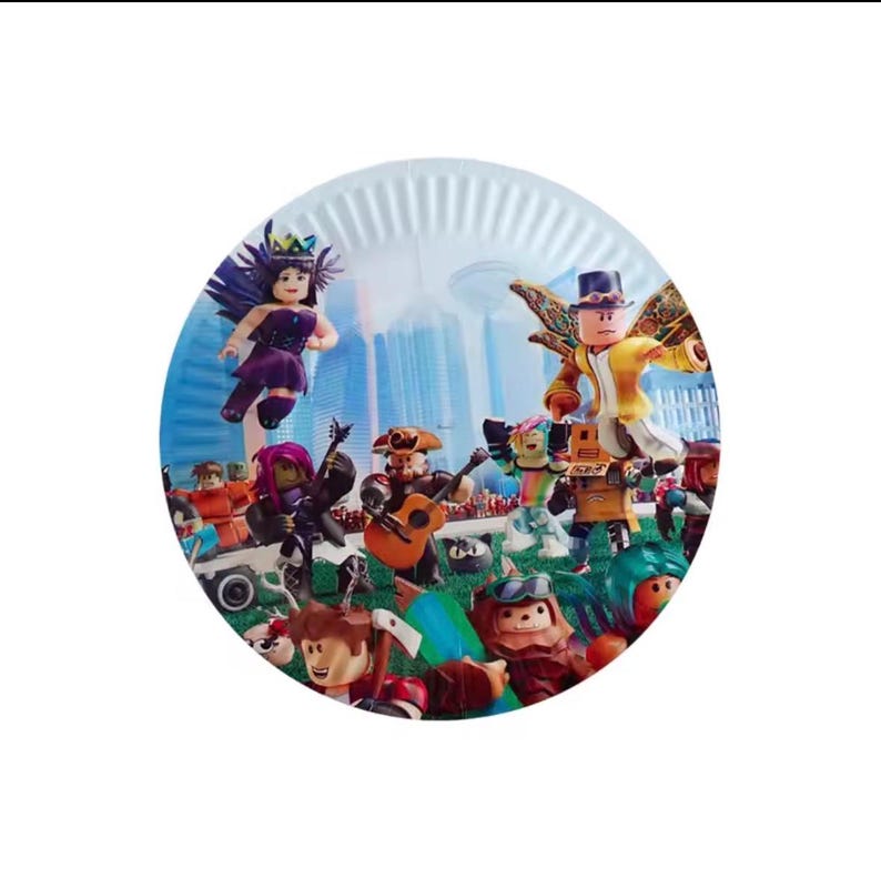 May include: A round paper plate featuring a colorful graphic print of various block-style character figures in a city setting. The characters include a fairy with purple wings, a musician with an acoustic guitar, and a figure wearing a top hat.