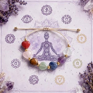 May include: A chakra bracelet featuring heart-shaped gemstones in various colors, including red, pink, and blue, strung on a beige cord. The bracelet is set against a lavender-colored background with chakra symbols and a meditating figure.