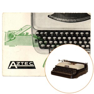 May include: A vintage black and white typewriter with the brand name "AZTEC" printed on the front. The typewriter has a standard keyboard layout with numbers and letters.