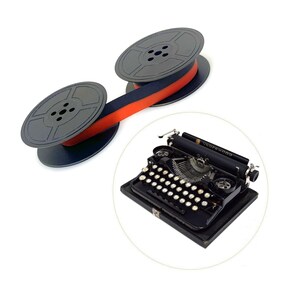 May include: An antique black Underwood typewriter with white keys and a black and red typewriter ribbon. The ribbon is on two black spools. The typewriter is in a circular frame.