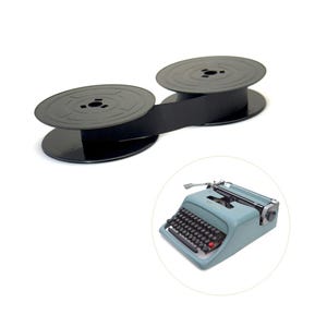 May include: A black typewriter ribbon spool and a light blue vintage typewriter are featured against a white background. The typewriter has black keys and a red button. The ribbon is a classic office supply.