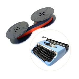 May include: A light blue Brother typewriter with black keys and a silver carriage, accompanied by two black plastic spools connected by a dual-colored red and black ink ribbon. The typewriter features a metallic label with the brand name Brother.
