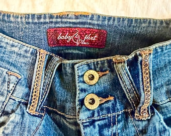 Y2K low rise baby phat jeans.