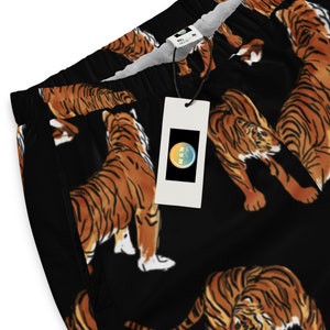 Bold Tigers All Over Print Unisex Track Pants, Tiger Mascot Men&#39;s Women&#39;s Bright Joggers, Zip Pockets, Colorful Activewear, Workout Pants