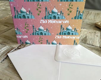 Carte de vœux pour l'Aïd, lever de soleil à la mosquée, avec enveloppe gaufrée à la main. Certifiée FSC, avec de discrètes étoiles à l'intérieur. Intérieur vierge pour votre message.