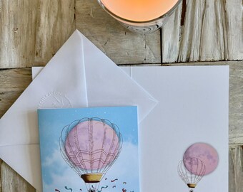 Carte de vœux bébé fille en montgolfière, lune rose créée à partir de mes propres photos. Intérieur vierge.