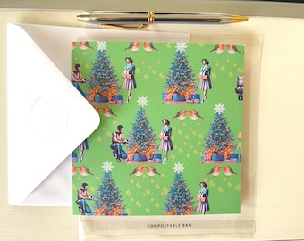 Carte de Noël rétro avec des rouges-gorges. Écologique, avec une enveloppe gaufrée à la main.