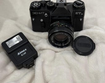 Zenit ET film camera with Helios 44M-6 58mm f/2 lens. Vintage 35mm camera in great condition. Perfect for retro film photos or collection.