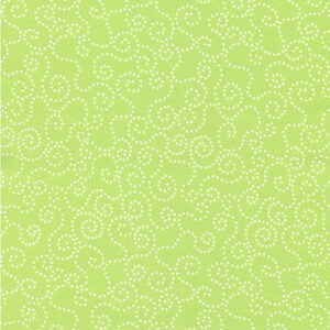 May include: A close-up of a lime green fabric with a repeating pattern of white, dotted swirls. The swirls create a flowing, organic design across the textile. The fabric has a slightly textured appearance.